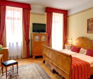 prague karlin hotels, bedroom at hotel mucha