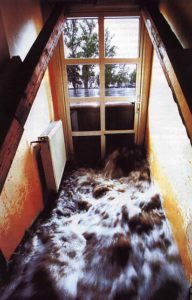 water rushing in a broken window