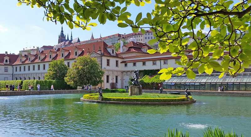 prague wallenstein gardes with pond in foreground and prague castle in background