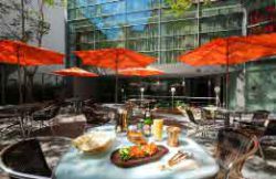 prague indian restaurants golden tikka katerinska set table outside with orange umbrellas