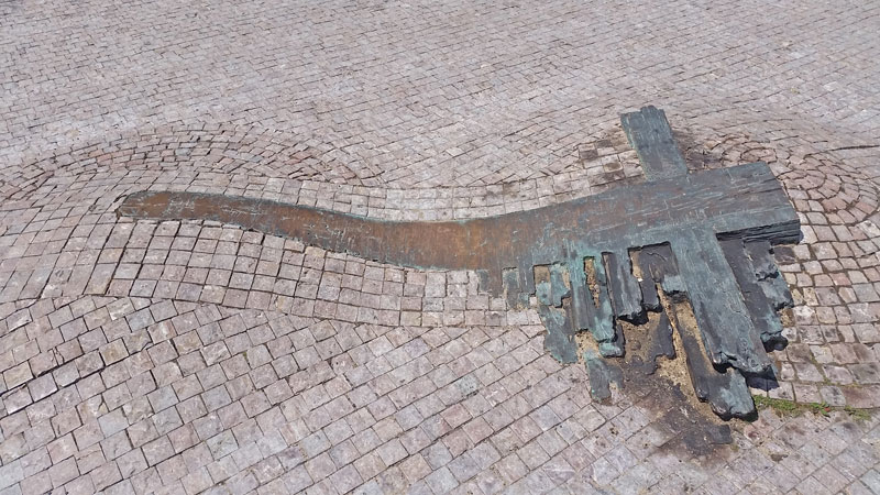 jan palach and jan zajic memorial cross on the pavement in front of the national museum