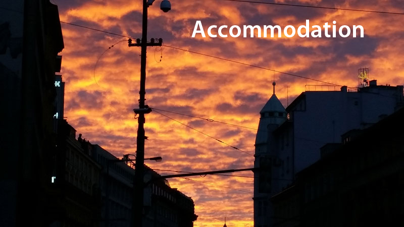 prague silhouetted buildings at sunset with orange sky