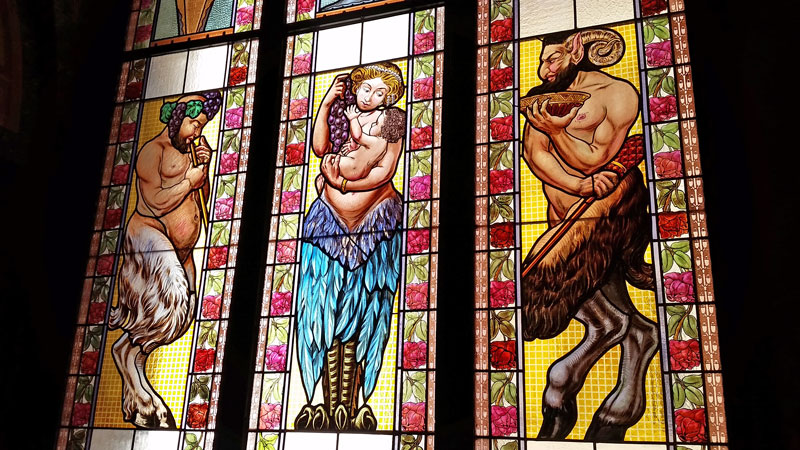 lucerna passage stained glass with greek folklore characters