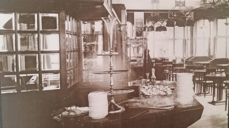 Sepia photo showing the cubist decor of the Prague grand cafe orient in 1912