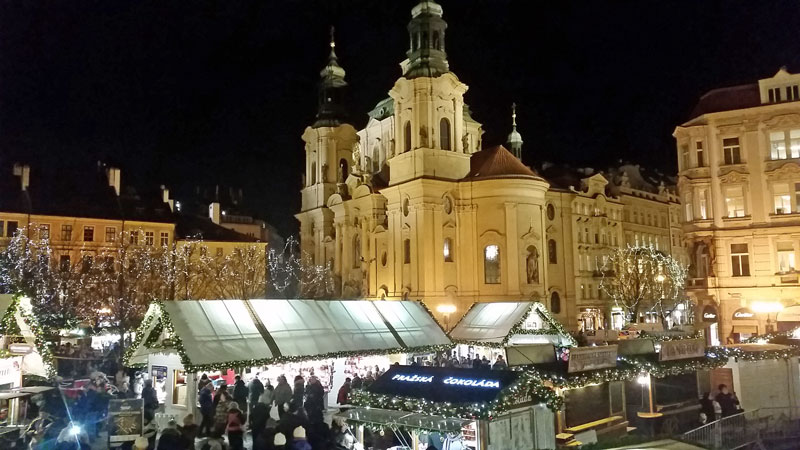 view of part of the prague old town square christmas market and st nicholas church