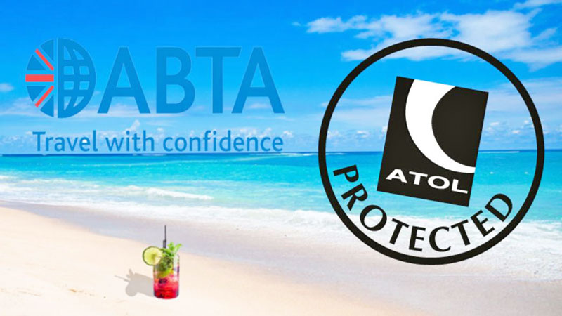 ABTA and ATOL on a beach background