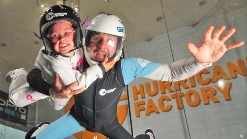 indoor skydiving with instructor and child