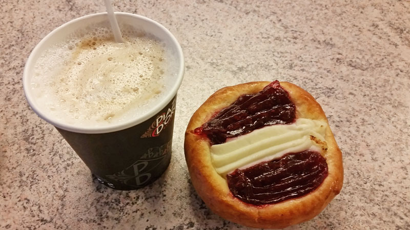 cup of coffee with a czech koláč cake