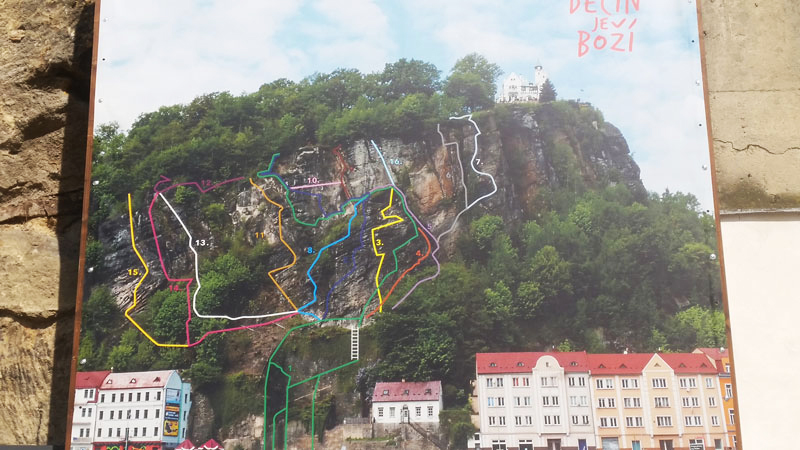 poster showing climbing routes at via ferrata