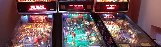 three pinball machines