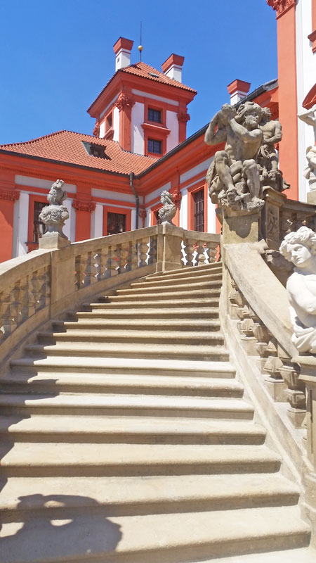 detail of a baroque stone staircase at the prague troja chateau