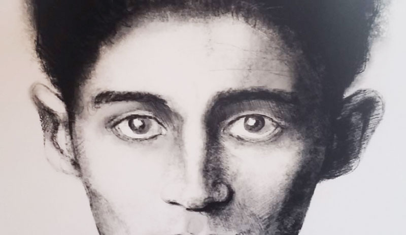 a black and white artistic sketch of the face of franz kafka