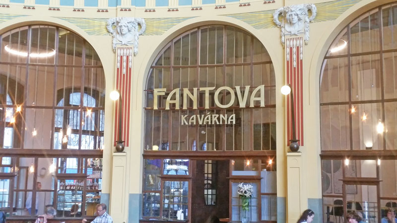 sign on the art nouveau fanta kavarna at prague main train station