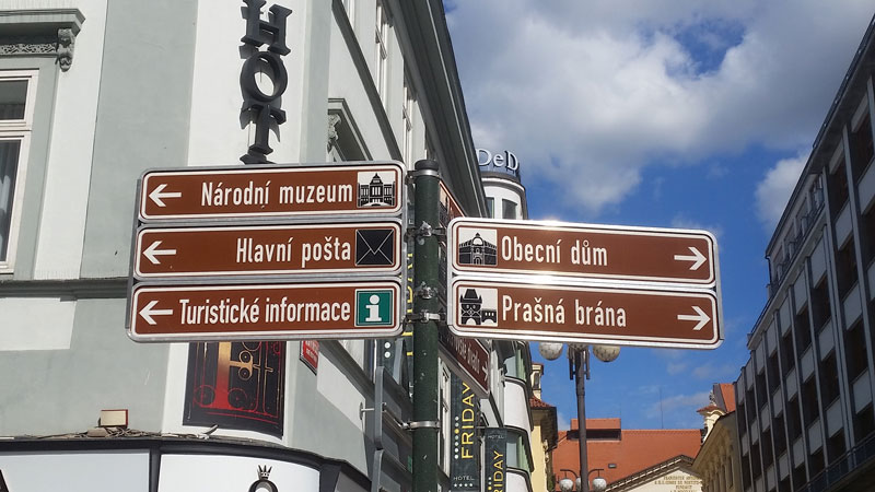 prague tourism sign posts in the new town