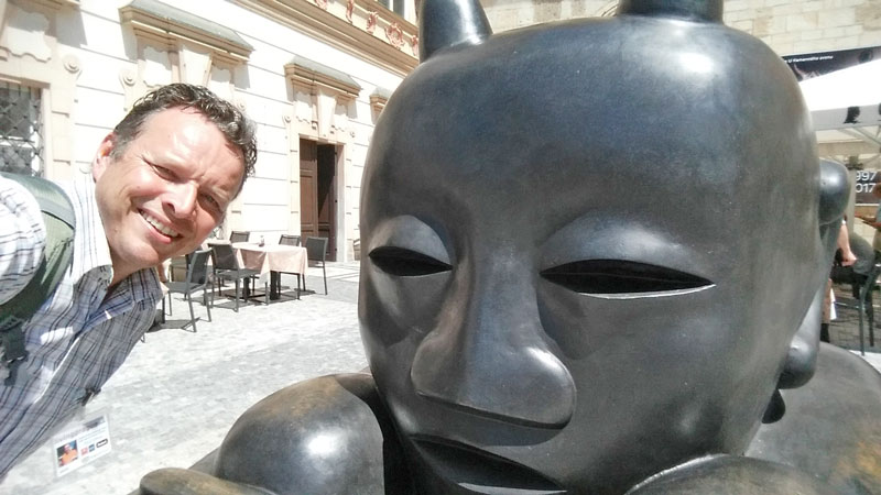 jaroslav rona bronze sculpture sitting devil on the old town square in 2017