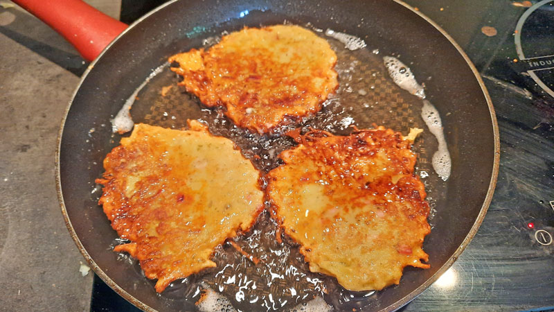 Frying Bramborak until golden brown