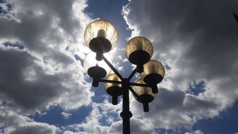 old town square prague new style street lamps with dramatic blue sky and cloud background