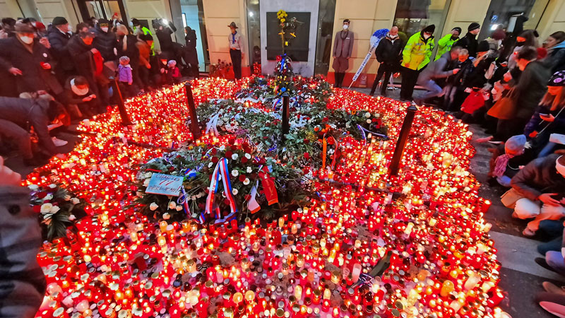 candles and wreaths on the 17-11-1989 memorial in prague narodni street