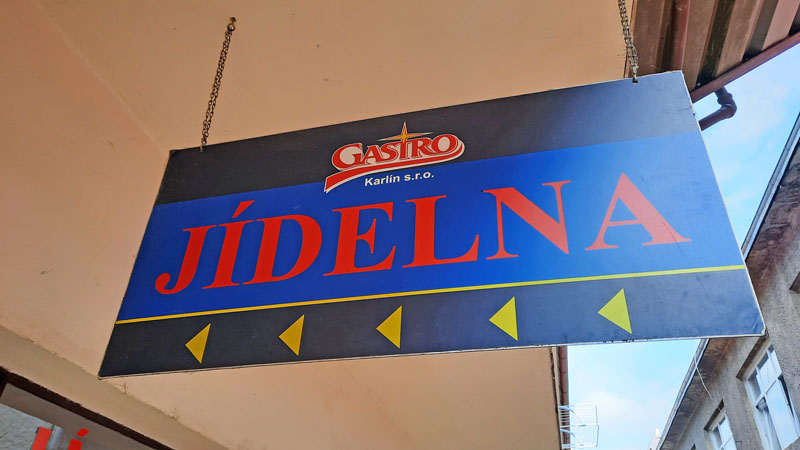 sign indicating the entry to the gastro karlin jidelna in prague