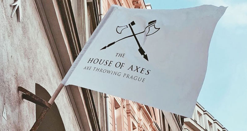 house of axes flag flying in cerna street in prague