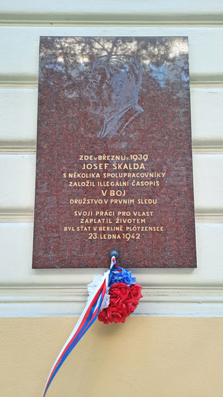 prague world war two memorial plaque to josef skalda with portrait and wreath