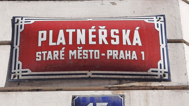 platnerska red and white street sign in prague old town