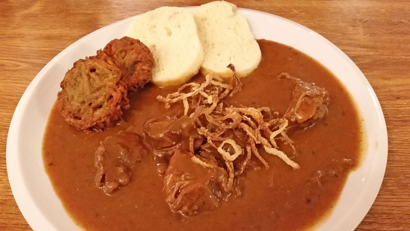 Prague Goulash - Beef with bread dumplings, bramboračky and fried onions