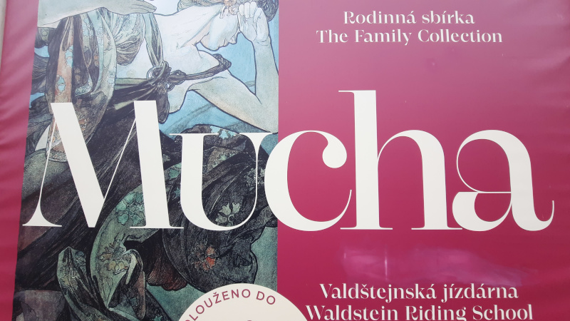 poster for an alfons mucha exhibition at the prague waldstein riding school