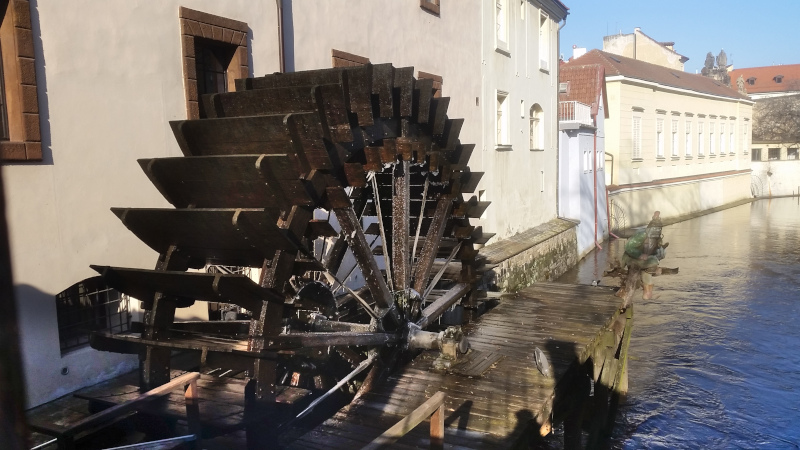 prague water wheel on the certovka inlet with vodnik kabourek water demon