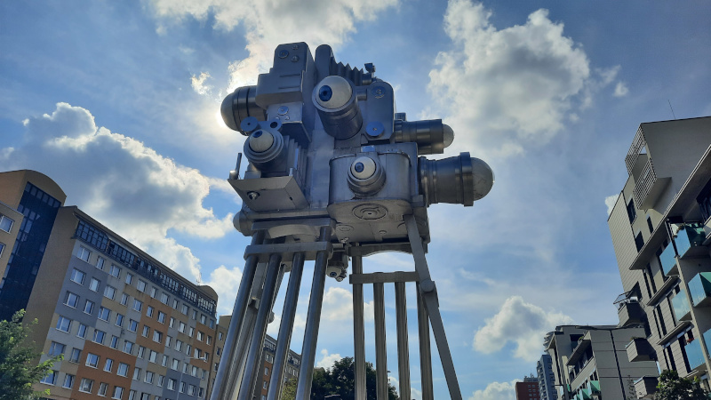 david cerny trifot sculpture in prague with multiple vintage cameras and eyeball lens