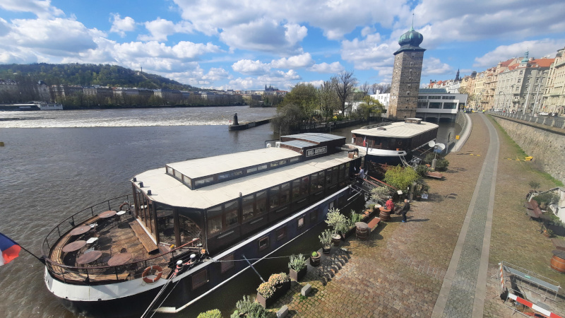 boat hotel matylda and klotylda moored on the river vltava in prague with quayside and river in view