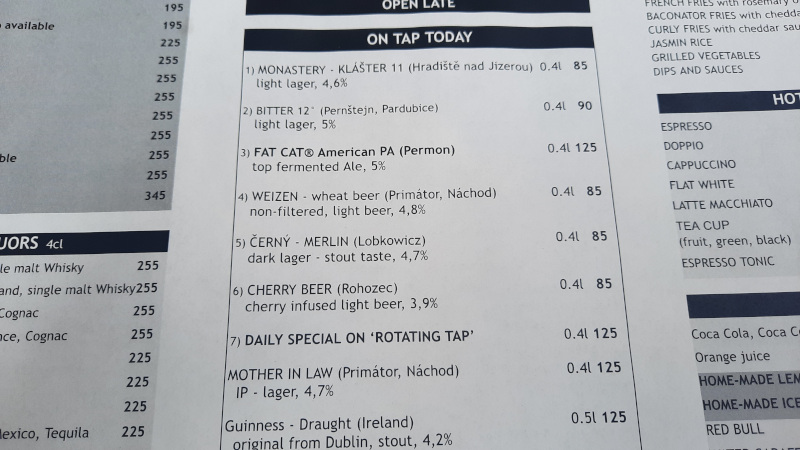 menu showing detail of a flight of beer at the fat cat restaurant in prague