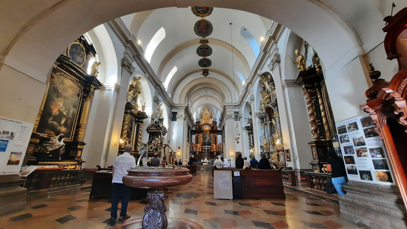 scene showing the interior of the church of our lady victorious with infant jesus of prague on the right