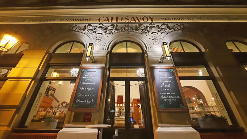 baroque exterior of the prague cafe savoy at night