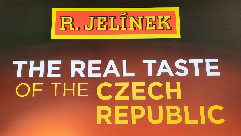 advert for r. jelinek products including slivovice at prague airport