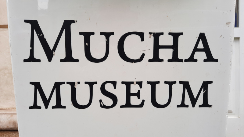 signage for prague alfons mucha museum