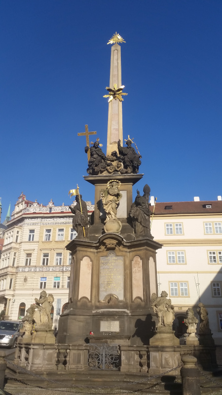 prague plague columns with the full length picture of the trinity column in the lesser town