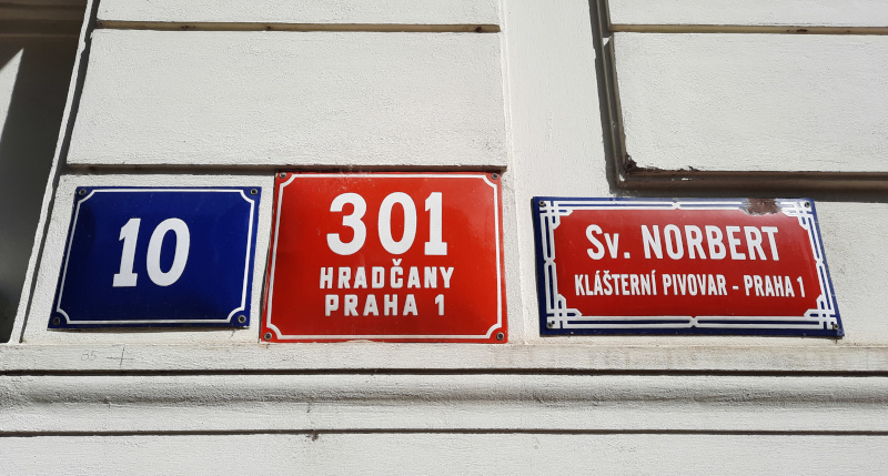 prague street signage with unofficial strahov brewery sign