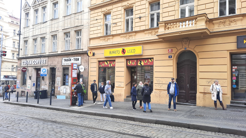 street scene strossmayerovo namesti tram stop in prague